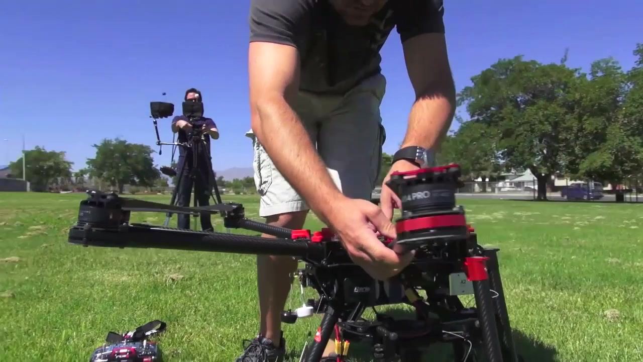 501 Studios drone pilot running a preflight check on a hexacopter camera drone in Las Vegas